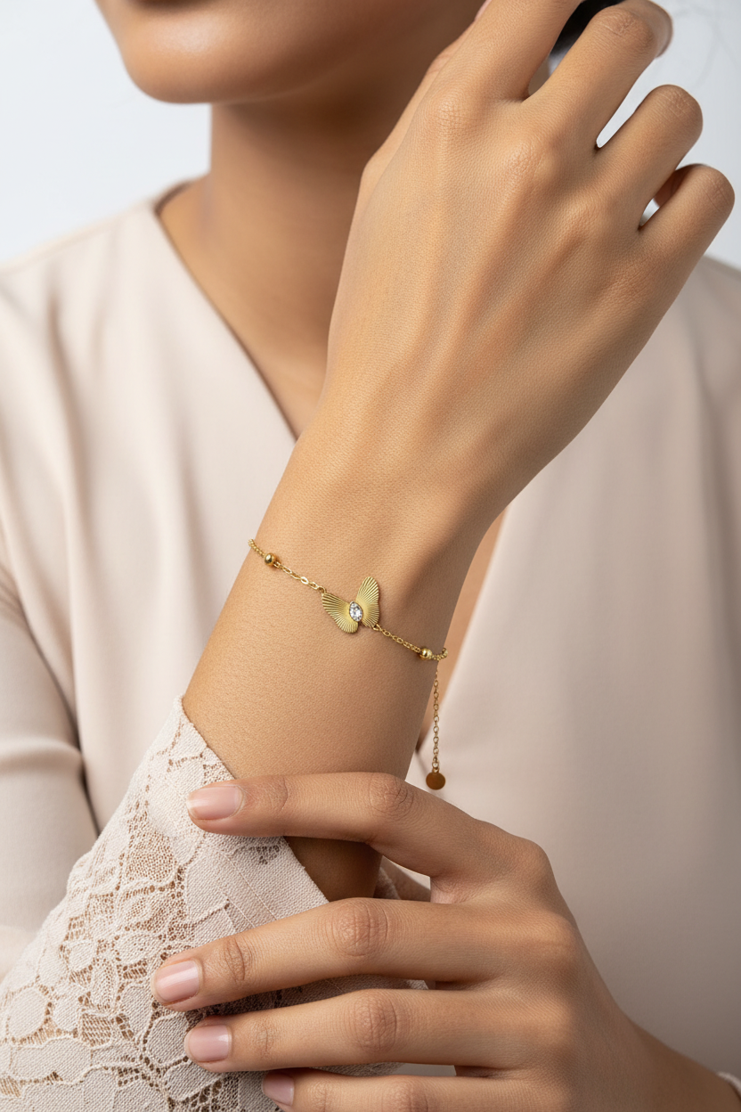 Gold Butterfly Charm Bracelet with Crystal Accents
