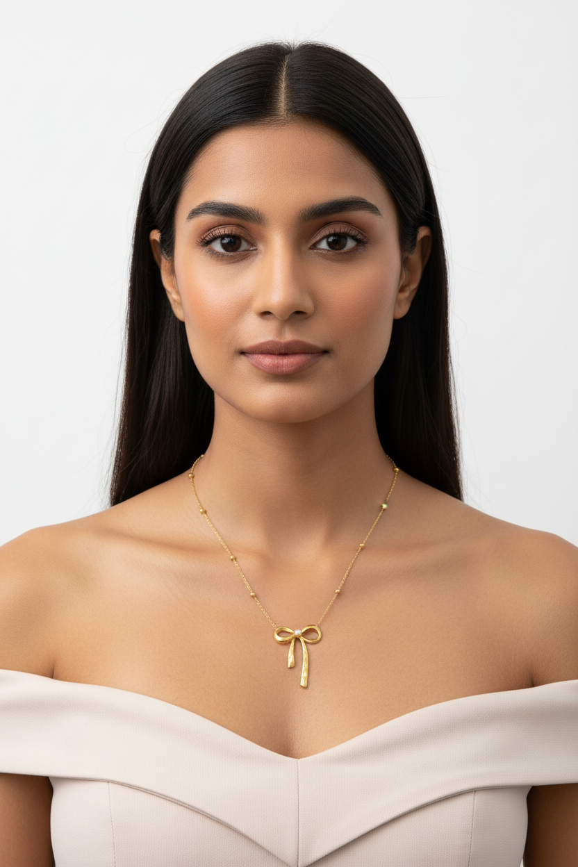 Gold Pearl-Center Bow Pendant