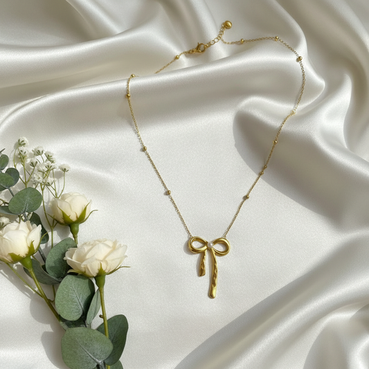 Gold Pearl-Center Bow Pendant