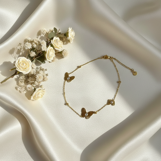 Gold Butterfly Charm Bracelet with Crystal Accents