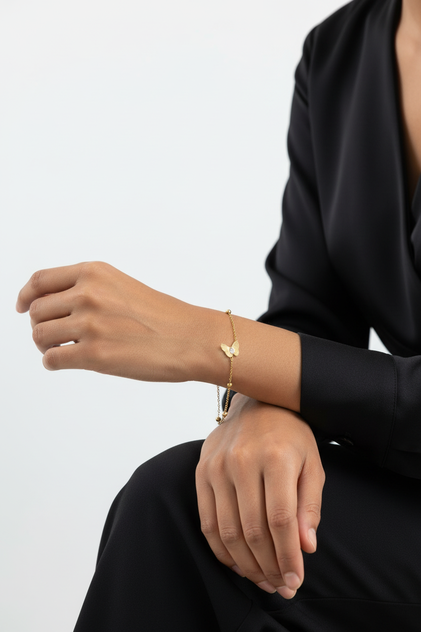 Gold Butterfly Charm Bracelet with Crystal Accents